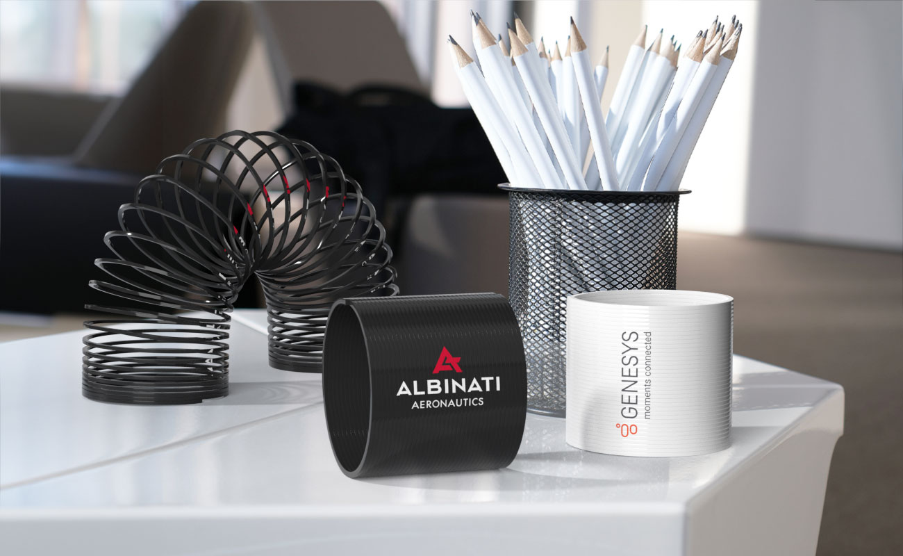 Reel - Oznakowana promocyjna zabawka sprężynka gallery thumbnail